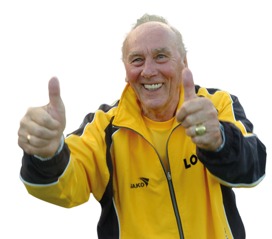 Eine Person tr gt eine gelb-schwarze Sportjacke und zeigt mit beiden H nden Daumen nach oben. Beschreibung von KI generiert