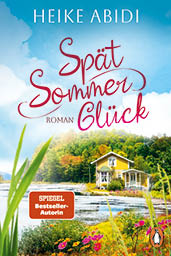 Das Buchcover zeigt den Titel „Sp t Sommer Gl ck“ von Heike Abidi mit einem gelben Haus am See vor bewaldetem Hintergrund und einem blauen Himmel. Beschreibung von KI generiert