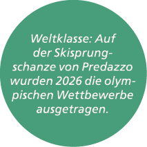 Weltklasse: Auf der Skisprungschanze von Predazzo wurden 2026 die olympischen Wettbewerbe ausgetragen.