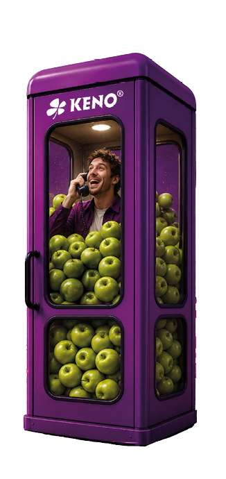 Eine Person steht in einer lila Telefonzelle, die mit gr nen pfeln gef llt ist, und spricht in ein Telefon.  Beschreibung von KI generiert